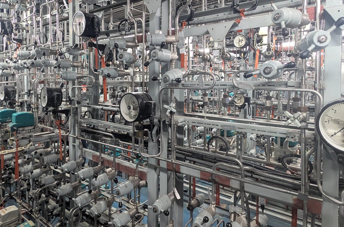 Bourdon tube pressure gauges on instrument lines in a power station transmitter room