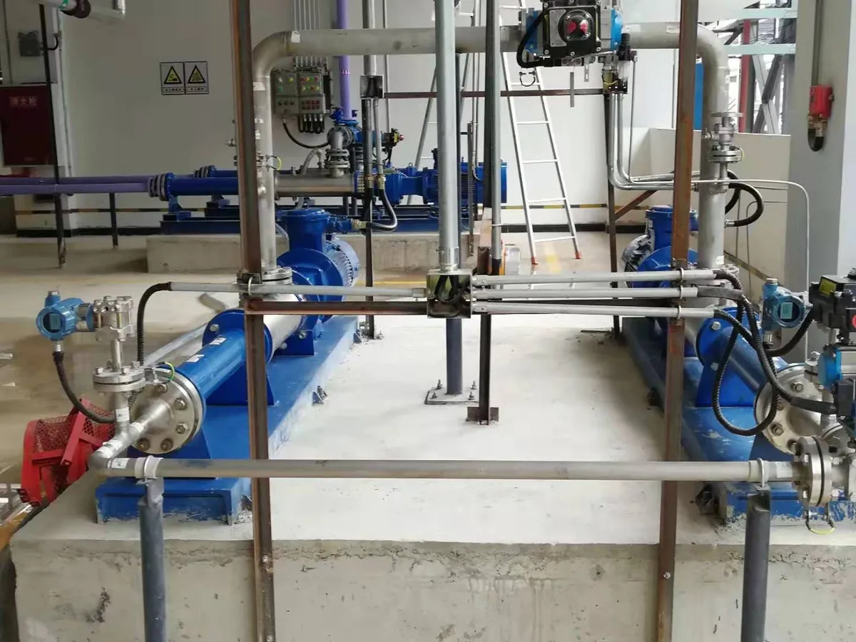 Two gauge pressure transmitters installed on pump discharge lines in a process plant