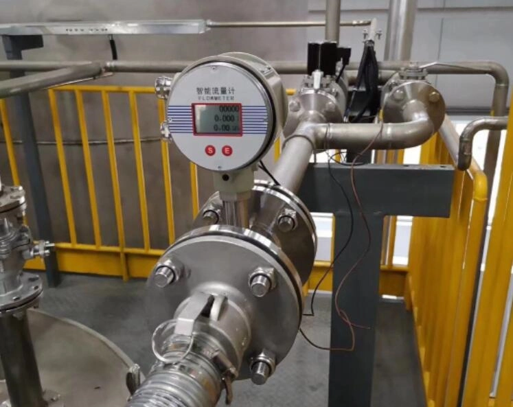 Inline flow meter with an integral display head on a stainless condensate line