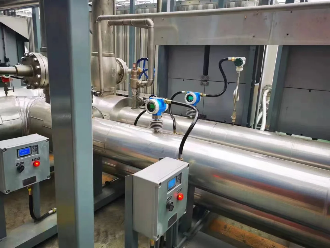 Flow transmitters and local display panels installed on an insulated process line