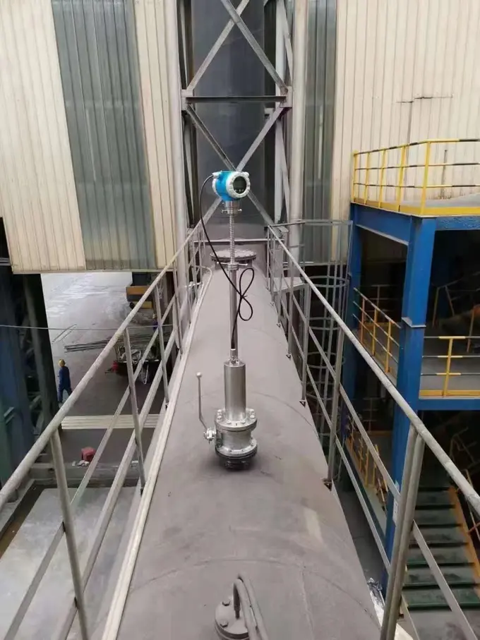 Insertion flow meter mounted through an isolation valve on a large process vessel line inside a plant