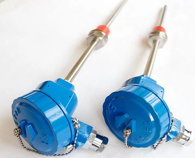 Blue connection heads laid out on a workbench before installation